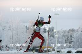 04.12.2010, Oestersund, Sweden (SWE): Brendan Green (CAN), Madshus, Rottefella, Leki - IBU world cup biathlon, sprint men, Oestersund (SWE). www.xpb.cc. © Manzoni/xpb.cc. Every downloaded picture is fee-liable.
