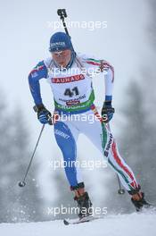10.12.2010, Hochfilzen, Austria (AUT): Lukas Hofer (ITA), Rossignol, Rottefella, Exel - IBU world cup biathlon, sprint men, Hochfilzen (AUT). www.xpb.cc. © Manzoni/xpb.cc. Every downloaded picture is fee-liable.
