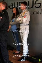 23.04.2010 Hockenheim, Germany,  Paul di Resta (GBR), Team HWA AMG Mercedes, AMG Mercedes C-Klasse with his girlfriend inside the garage. - DTM 2010 at Hockenheimring, Hockenheim, Germany