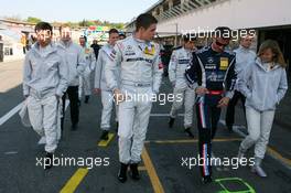 24.04.2010 Hockenheim, Germany,  Mercedes racing drivers walking through the pitlane - DTM 2010 at Hockenheimring, Hockenheim, Germany