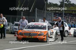 25.04.2010 Hockenheim, Germany,  Gary Paffett (GBR), Team HWA AMG Mercedes, AMG Mercedes C-Klasse is shoved in the Parc Ferme - DTM 2010 at Hockenheimring, Hockenheim, Germany