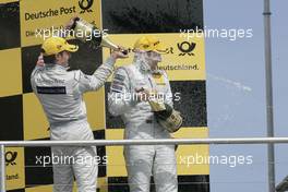 25.04.2010 Hockenheim, Germany,  Podium, Bruno Spengler (CAN), Team HWA AMG Mercedes, AMG Mercedes C-Klasse, Gary Paffett (GBR), Team HWA AMG Mercedes, AMG Mercedes C-Klasse - DTM 2010 at Hockenheimring, Hockenheim, Germany