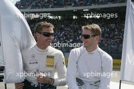 25.04.2010 Hockenheim, Germany,  David Coulthard (GBR), Mücke Motorsport, AMG Mercedes C-Klasse and Maro Engel (GER), Mücke Motorsport, AMG Mercedes C-Klasse - DTM 2010 at Hockenheimring, Hockenheim, Germany