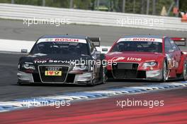 25.04.2010 Hockenheim, Germany,  Timo Scheider (GER), Audi Sport Team Abt, Audi A4 DTM and Mike Rockenfeller (GBR), Audi Sport Team Phoenix, Audi A4 DTM - DTM 2010 at Hockenheimring, Hockenheim, Germany