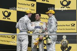 25.04.2010 Hockenheim, Germany,  Podium, 3rd Jamie Green (GBR), Persson Motorsport, AMG Mercedes C-Klasse, 2nd Bruno Spengler (CAN), Team HWA AMG Mercedes, AMG Mercedes C-Klasse, 1st Gary Paffett (GBR), Team HWA AMG Mercedes, AMG Mercedes C-Klasse - DTM 2010 at Hockenheimring, Hockenheim, Germany