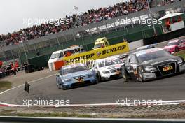 22.08.2010 Zandvoort, The Netherlands,  (left) Jamie Green (GBR), Persson Motorsport, AMG Mercedes C-Klasse and (right) Maro Engel (GER), Mücke Motorsport, AMG Mercedes C-Klasse colliding in the first part resulted in losing body parts for Jamie Green. - DTM 2010 at Circuit Park Zandvoort, The Netherlands