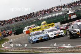 22.08.2010 Zandvoort, The Netherlands,  (left) Jamie Green (GBR), Persson Motorsport, AMG Mercedes C-Klasse and (right) Maro Engel (GER), Mücke Motorsport, AMG Mercedes C-Klasse colliding in the first part resulted in losing body parts for Jamie Green. - DTM 2010 at Circuit Park Zandvoort, The Netherlands
