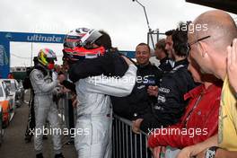 22.08.2010 Zandvoort, The Netherlands,  Gary Paffett (GBR), Team HWA AMG Mercedes, AMG Mercedes C-Klasse being congratulated in parc ferme. - DTM 2010 at Circuit Park Zandvoort, The Netherlands