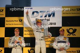 28.11.2010 Shanghai, China,  Championship Podium 2010, 2nd Gary Paffett (GBR), Team HWA AMG Mercedes, AMG Mercedes C-Klasse, 1st Paul di Resta (GBR), Team HWA AMG Mercedes, AMG Mercedes C-Klasse, 3rd Bruno Spengler (CAN), Team HWA AMG Mercedes, AMG Mercedes C-Klasse - DTM 2010 at Hockenheimring