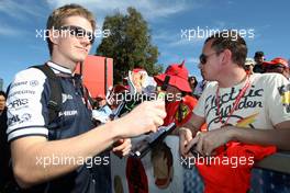 26.03.2010 Melbourne, Australia,  Nico Hulkenberg (GER), Williams F1 Team, Signing autographs,  - Formula 1 World Championship, Rd 2, Australian Grand Prix, Friday