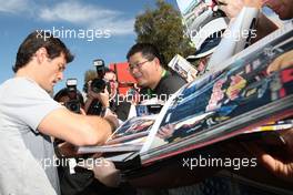 26.03.2010 Melbourne, Australia,  Mark Webber (AUS), Red Bull Racing, Signing autographs,  - Formula 1 World Championship, Rd 2, Australian Grand Prix, Friday