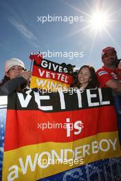 26.03.2010 Melbourne, Australia,  Fans of Sebastian Vettel (GER), Red Bull Racing  - Formula 1 World Championship, Rd 2, Australian Grand Prix, Friday