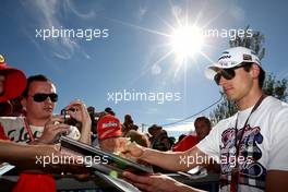 26.03.2010 Melbourne, Australia,  Adrian Sutil (GER), Force India F1 Team, Signing autographs,  - Formula 1 World Championship, Rd 2, Australian Grand Prix, Friday