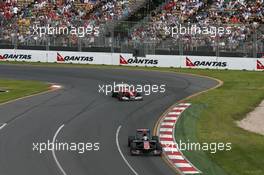 26.03.2010 Melbourne, Australia,  Sébastien Buemi (SUI), Scuderia Toro Rosso leads Fernando Alonso (ESP), Scuderia Ferrari, F10  - Formula 1 World Championship, Rd 2, Australian Grand Prix, Friday Practice