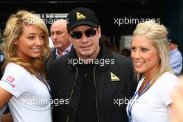 28.03.2010 Melbourne, Australia,  John Travolta  - Formula 1 World Championship, Rd 2, Australian Grand Prix, Sunday Grid Girl