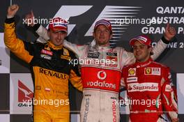 28.03.2010 Melbourne, Australia,  2nd place Robert Kubica (POL), Renault F1 Team with 1st place Jenson Button (GBR), McLaren Mercedes and 3rd place Felipe Massa (BRA), Scuderia Ferrari - Formula 1 World Championship, Rd 2, Australian Grand Prix, Sunday Podium