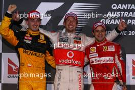 28.03.2010 Melbourne, Australia,  2nd place Robert Kubica (POL), Renault F1 Team with 1st place Jenson Button (GBR), McLaren Mercedes and 3rd place Felipe Massa (BRA), Scuderia Ferrari - Formula 1 World Championship, Rd 2, Australian Grand Prix, Sunday Podium