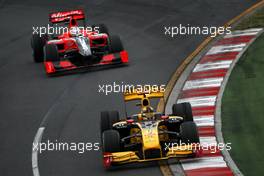 28.03.2010 Melbourne, Australia,  Robert Kubica (POL), Renault F1 Team, R30, Lucas di Grassi (BRA), Virgin Racing VR-01 - Formula 1 World Championship, Rd 2, Australian Grand Prix, Sunday Race