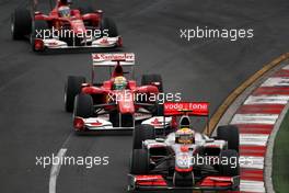 28.03.2010 Melbourne, Australia,  Lewis Hamilton (GBR), McLaren Mercedes, MP4-25 leads Felipe Massa (BRA), Scuderia Ferrari, F10 leads Fernando Alonso (ESP), Scuderia Ferrari, F10 - Formula 1 World Championship, Rd 2, Australian Grand Prix, Sunday Race