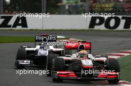 28.03.2010 Melbourne, Australia,  Lewis Hamilton (GBR), McLaren Mercedes, MP4-25 leads Rubens Barrichello (BRA), Williams F1 Team, FW32 - Formula 1 World Championship, Rd 2, Australian Grand Prix, Sunday Race
