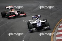 28.03.2010 Melbourne, Australia,  Rubens Barrichello (BRA), Williams F1 Team, FW32, Karun Chandhok (IND), Hispania Racing F1 Team HRT- Formula 1 World Championship, Rd 2, Australian Grand Prix, Sunday Race