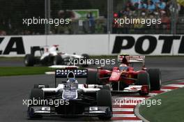 28.03.2010 Melbourne, Australia,  Rubens Barrichello (BRA), Williams F1 Team, FW32 leads Fernando Alonso (ESP), Scuderia Ferrari, F10 - Formula 1 World Championship, Rd 2, Australian Grand Prix, Sunday Race