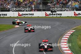 28.03.2010 Melbourne, Australia,  Jenson Button (GBR), McLaren Mercedes leads Lewis Hamilton (GBR), McLaren Mercedes - Formula 1 World Championship, Rd 2, Australian Grand Prix, Sunday Race