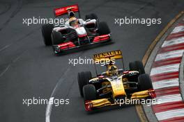 28.03.2010 Melbourne, Australia,  Robert Kubica (POL), Renault F1 Team, R30 leads Lewis Hamilton (GBR), McLaren Mercedes, MP4-25 - Formula 1 World Championship, Rd 2, Australian Grand Prix, Sunday Race