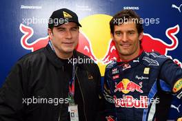 27.03.2010 Melbourne, Australia,  John Travolta with Mark Webber (AUS), Red Bull Racing - Formula 1 World Championship, Rd 2, Australian Grand Prix, Saturday