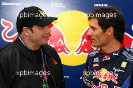 27.03.2010 Melbourne, Australia,  John Travolta (USA), Actor and Mark Webber (AUS), Red Bull Racing  - Formula 1 World Championship, Rd 2, Australian Grand Prix, Saturday