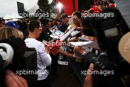 28.03.2010 Melbourne, Australia,  Michael Schumacher (GER), Mercedes GP Petronas signing autographs - Formula 1 World Championship, Rd 2, Australian Grand Prix, Sunday