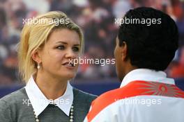 28.03.2010 Melbourne, Australia,  Corina Schumacher (GER), Corinna, Wife of Michael Schumacher and Balbir Singh (ex. Pysio of M. Schumacher) - Formula 1 World Championship, Rd 2, Australian Grand Prix, Sunday