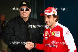 28.03.2010 Melbourne, Australia,  John Travolta with Fernando Alonso (ESP), Scuderia Ferrari - Formula 1 World Championship, Rd 2, Australian Grand Prix, Sunday