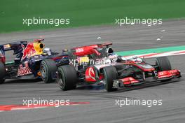 29.08.2010 Spa, Belgium,  Jenson Button (GBR), McLaren Mercedes and Sebastian Vettel (GER), Red Bull Racing  - Formula 1 World Championship, Rd 13, Belgium Grand Prix, Sunday Race