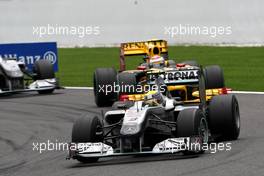 29.08.2010 Spa, Belgium,  Nico Rosberg (GER), Mercedes GP Petronas leads Vitaly Petrov (RUS), Renault F1 Team - Formula 1 World Championship, Rd 13, Belgium Grand Prix, Sunday Race