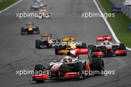29.08.2010 Spa, Belgium,  Lewis Hamilton (GBR), McLaren Mercedes leads Jenson Button (GBR), McLaren Mercedes - Formula 1 World Championship, Rd 13, Belgium Grand Prix, Sunday Race