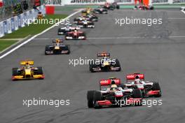 29.08.2010 Spa, Belgium,  Lewis Hamilton (GBR), McLaren Mercedes leads Jenson Button (GBR), McLaren Mercedes at the restart - Formula 1 World Championship, Rd 13, Belgium Grand Prix, Sunday Race