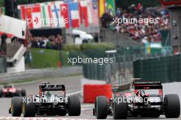 29.08.2010 Spa, Belgium,  Jarno Trulli (ITA), Lotus F1 Team, T127, Lucas di Grassi (BRA), Virgin Racing - Formula 1 World Championship, Rd 13, Belgium Grand Prix, Sunday Race