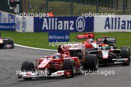 29.08.2010 Spa, Belgium,  Felipe Massa (BRA), Scuderia Ferrari leads Sakon Yamamoto (JPN), Hispania Racing F1 Team HRT - Formula 1 World Championship, Rd 13, Belgium Grand Prix, Sunday Race