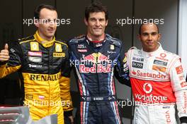 28.08.2010 Spa, Belgium,  Robert Kubica (POL), Renault F1 Team 3rd place, Mark Webber (AUS), Red Bull Racing, pole position, Lewis Hamilton (GBR), McLaren Mercedes 2nd place - Formula 1 World Championship, Rd 13, Belgium Grand Prix, Saturday Qualifying