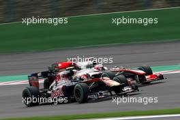 28.08.2010 Spa, Belgium,  Sebastien Buemi (SUI), Scuderia Toro Rosso and Jenson Button (GBR), McLaren Mercedes   - Formula 1 World Championship, Rd 13, Belgium Grand Prix, Saturday Qualifying