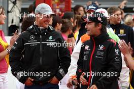 29.08.2010 Spa, Belgium,  Michael Schumacher (GER), Mercedes GP Petronas, Timo Glock (GER), Virgin Racing - Formula 1 World Championship, Rd 13, Belgium Grand Prix, Sunday