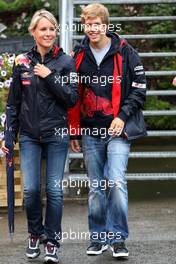 26.08.2010 Spa, Belgium,  Britta Roeske (Press Officer) with Sebastian Vettel (GER), Red Bull Racing - Formula 1 World Championship, Rd 13, Belgium Grand Prix, Thursday