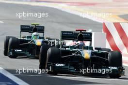 12.03.2010 Sakhir, Bahrain,  Jarno Trulli (ITA), Lotus F1 Team, T127, Heikki Kovalainen (FIN), Lotus F1 Team, T127 - Formula 1 World Championship, Rd 1, Bahrain Grand Prix, Friday Practice