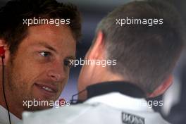 12.03.2010 Sakhir, Bahrain,  Jenson Button (GBR), McLaren Mercedes, Martin Whitmarsh (GBR), McLaren, Chief Executive Officer - Formula 1 World Championship, Rd 1, Bahrain Grand Prix, Friday Practice