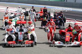 12.03.2010 Sakhir, Bahrain,  Michael Schumacher (GER), Mercedes GP Petronas, driver and team photo - Formula 1 World Championship, Rd 1, Bahrain Grand Prix, Friday