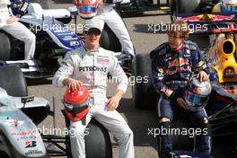 12.03.2010 Sakhir, Bahrain,  Michael Schumacher (GER), Mercedes GP Petronas, Sebastian Vettel (GER), Red Bull Racing - Formula 1 World Championship, Rd 1, Bahrain Grand Prix, Friday