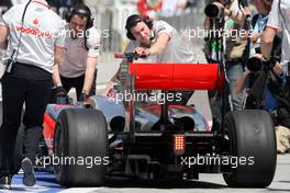 12.03.2010 Sakhir, Bahrain,  Jenson Button (GBR), McLaren Mercedes, MP4-25 - Formula 1 World Championship, Rd 1, Bahrain Grand Prix, Friday Practice