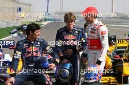 12.03.2010 Sakhir, Bahrain,  Mark Webber (AUS), Red Bull Racing with Sebastian Vettel (GER), Red Bull Racing and Jenson Button (GBR), McLaren Mercedes - Formula 1 World Championship, Rd 1, Bahrain Grand Prix, Friday
