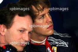 12.03.2010 Sakhir, Bahrain,  Christian Horner (GBR), Red Bull Racing, Sporting Director, Sebastian Vettel (GER), Red Bull Racing - Formula 1 World Championship, Rd 1, Bahrain Grand Prix, Friday Practice